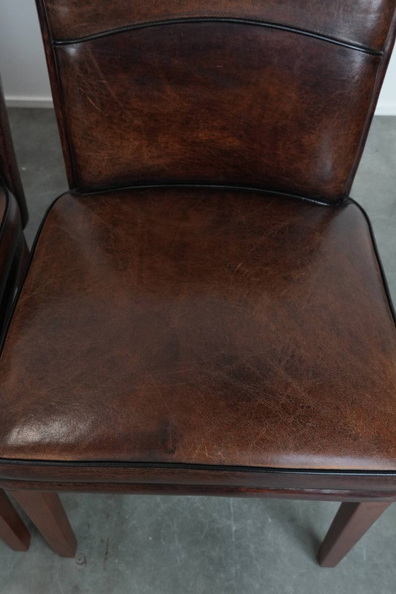 Image 1 of 4 chaises de salle à manger confortables en peau de mouton avec du caractère