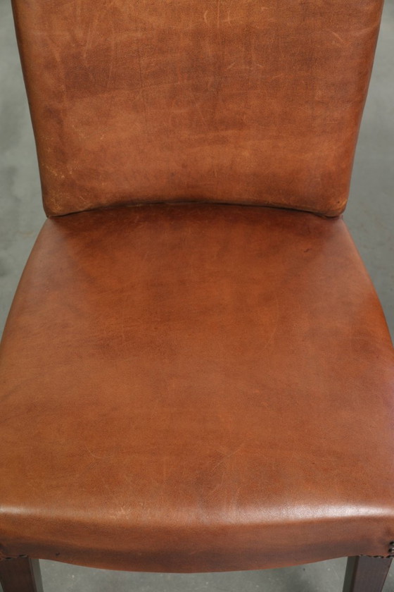 6x Begeerlijke schapenleren eetkamerstoel in een mooie cognac kleur met een mooi patina – Eetkamerstoelen (photo 11 of 17)