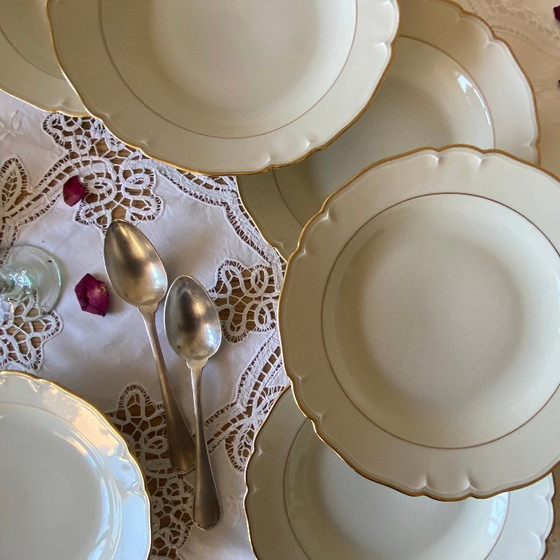 Image 1 of Set of 6 antique off-white porcelain soup plates with gold rim, Limoges ULIM