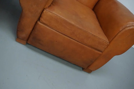 Image 1 of Ein Paar französischer cognacfarbener Ledersessel mit schnurrbartförmigen Rückenlehnen, 1950er Jahre