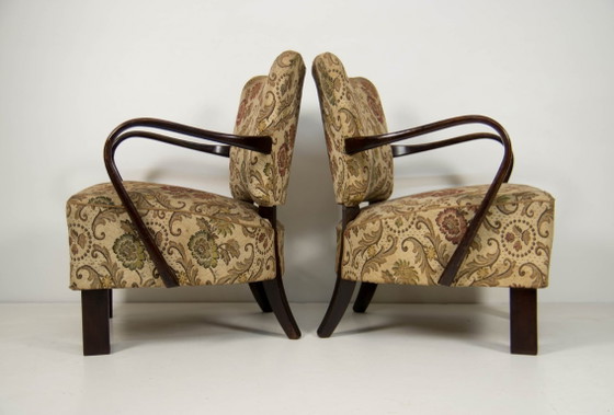 Image 1 of Een paar art deco fauteuils van gebogen hout met originele bloemenbekleding, circa jaren 1930.