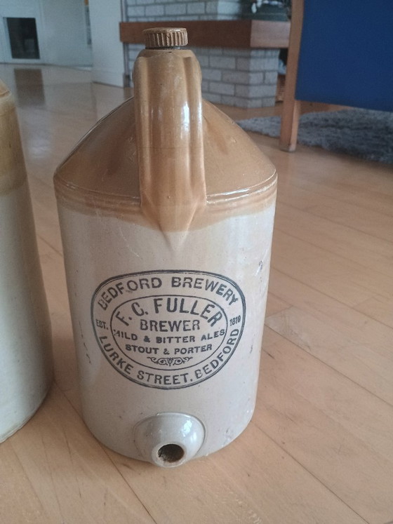 Image 1 of Antieke Engelse bierkruiken (set van 2)