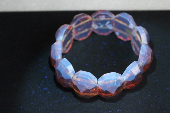 Image 1 of Amber bracelet, intricately cut, 46 grams of honey amber.