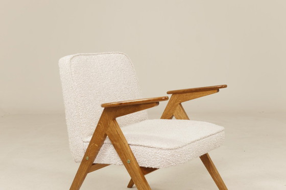 Image 1 of Fauteuil vintage chêne rustique pearl bouclé conclu par Chierowski 