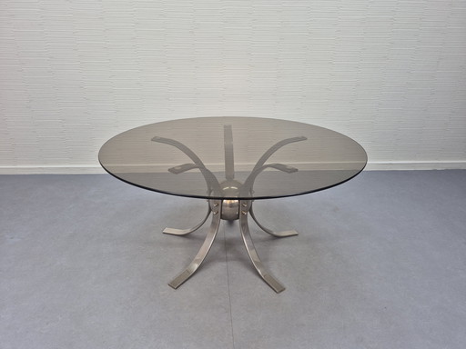 Table basse « Sputnik ». Table vintage en verre fumé avec finitions chromées.