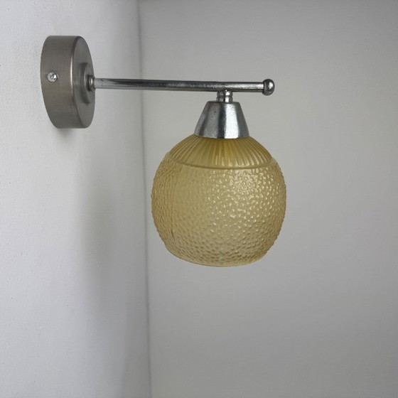 Image 1 of PAAR VINTAGE AMBERKLEURIGE WANDLAMPEN