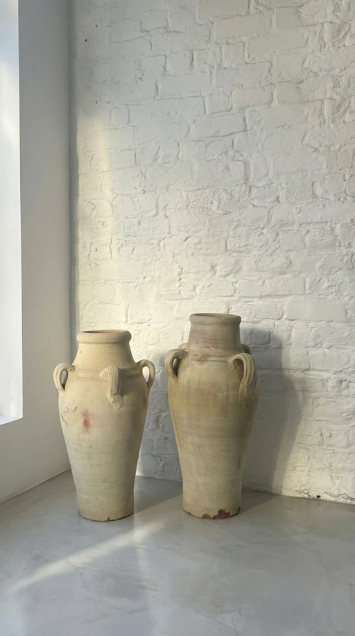Pair of vintage terracotta amphorae