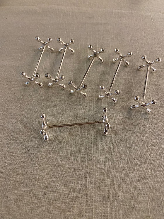 Image 1 of EN VENTA: 6 soportes / accesorios plateados para cuchillos