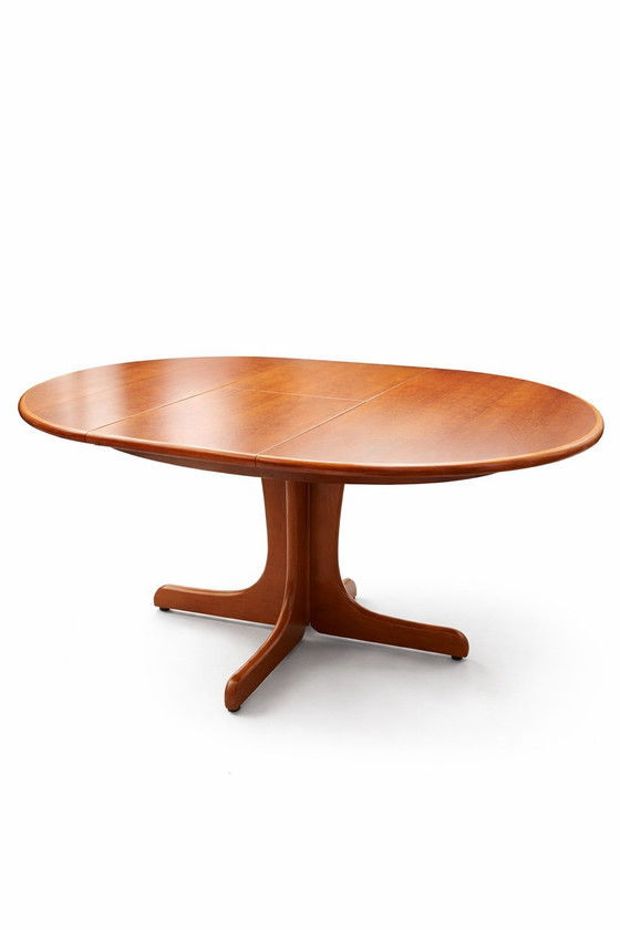 Image 1 of Extendable round to oval dining table