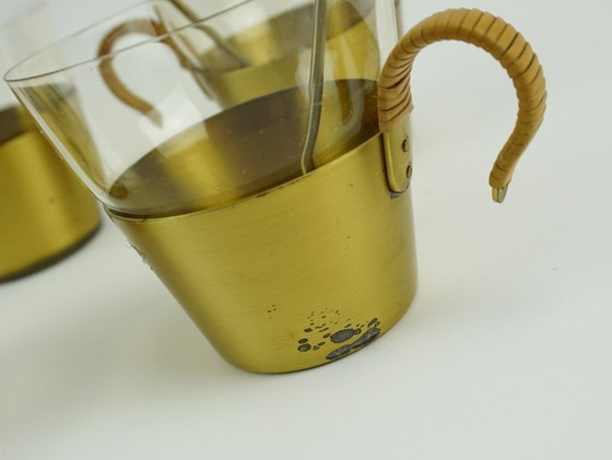 Image 1 of Ensemble de 4 verres à thé style années 50, signés Hein Matten, support en laiton, anses en raphia.