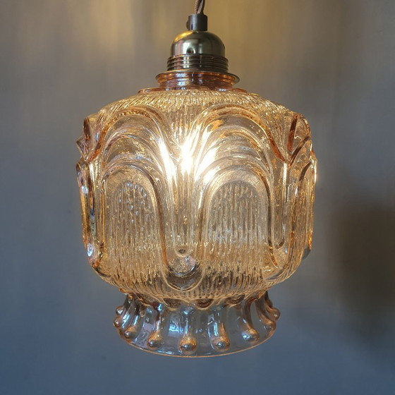 Image 1 of Set of 2 Vintage textured rose / amber tinted pendant lamps - mid-century design.
