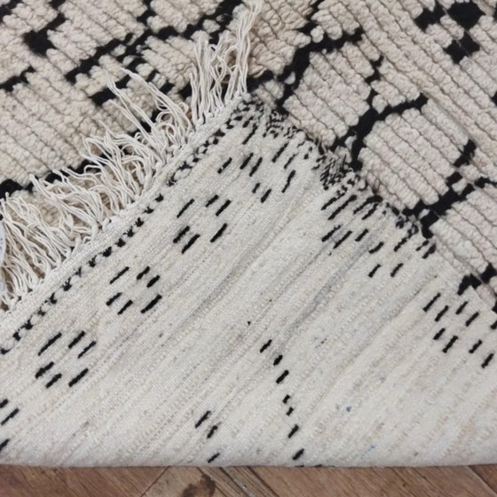 Image 1 of Natural Wool Berber Rug – Black Geometric Patterns Handwoven (175 × 125 cm)