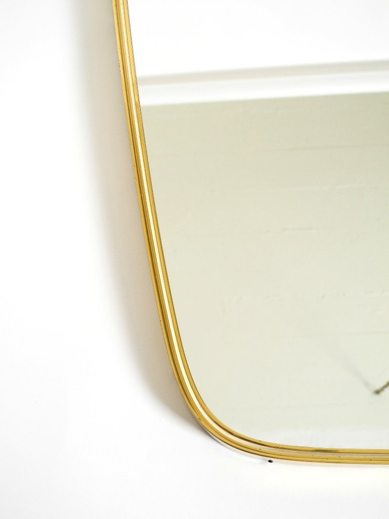 Image 1 of A pair of rare original Mid Century Modern "Münchener Zierspiegel" wall mirrors with heavy brass frames