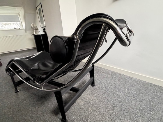 Image 1 of Corbusier lounge chair in black leather with a silver frame and black base