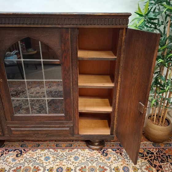 Antique oak sideboard with a central glass door and striking ball feet – Wood (photo 10 of 15)