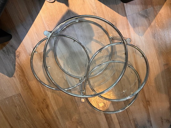 Unique vintage Italian coffee table with chrome frame and four round glass tops. Three outer tops can be (photo 7 of 10)