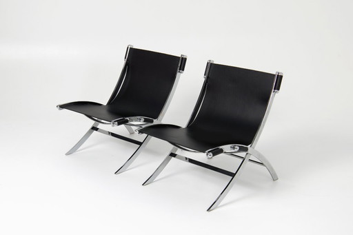  Een set schaarstoelen - Paul Tuttle & Antonio Citterio
