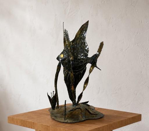 Large brutalist sculpture of an angelfish made of welded metal, circa 1970