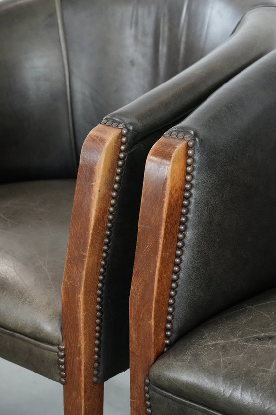 Image 1 of 2 sedie a vasca in pelle di mucca e legno con una bella e robusta combinazione di colori