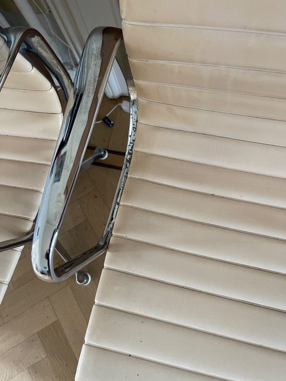 Image 1 of Chaise Eames originale des années 60-70 avec étiquette