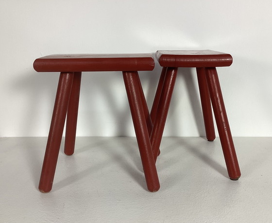 Image 1 of Two red vintage wooden stools side tables