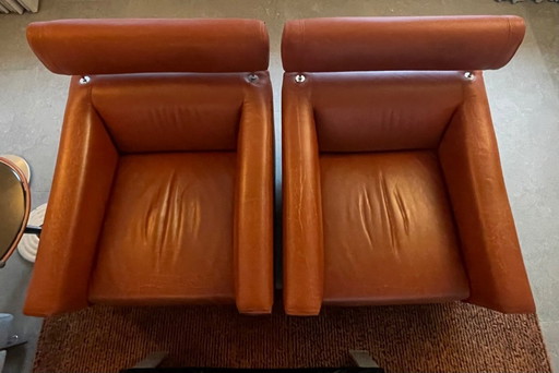 Set aus zwei Leolux Patachou Ledersesseln. Farbe: Oxid