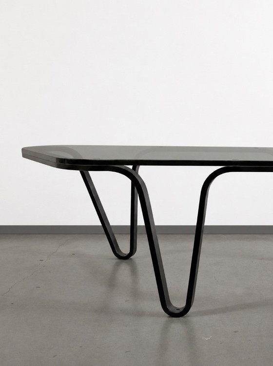 Image 1 of Table basse design artisanale – Pièce unique en acier sculptural et verre fumé, 180 × 60 × 40 cm