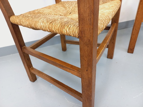 Image 1 of Suite van 2 vintage Brutalistische fauteuils in eiken en stro uit de jaren 60