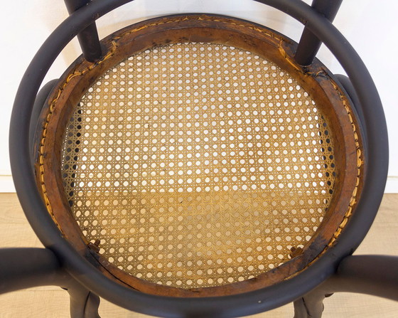 Image 1 of Poltrona curva in legno curvato con seduta a griglia