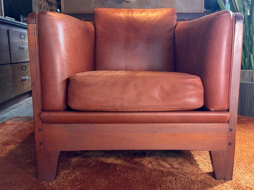 Schuitema Shaker comfortable club armchair in cognac aniline leather with graphic textile panels all around