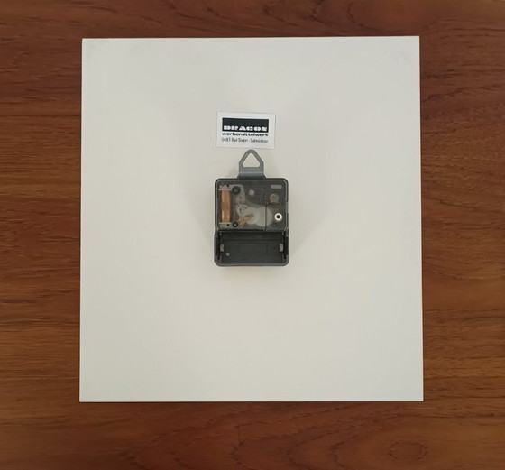 Image 1 of 1970s wall clock with advertising