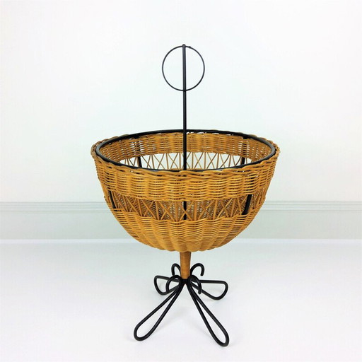 Vintage rattan basket on 4 black lacquered metal legs, 1950