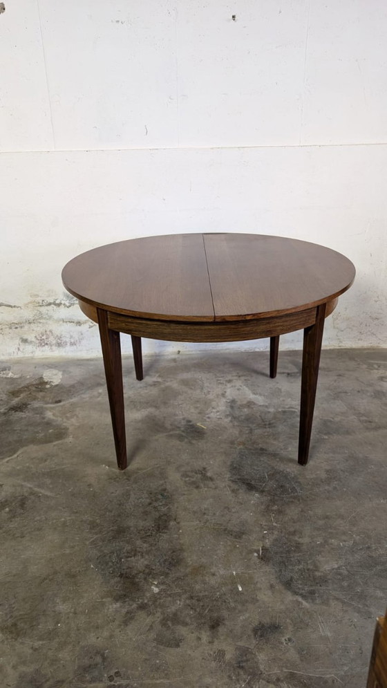 Image 1 of Vintage extendable dining table - round model in teak veneer- mid - Century