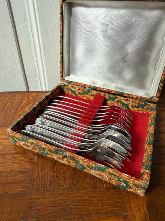 Image 1 of Set aus 12 Degrenne-Silbergabeln