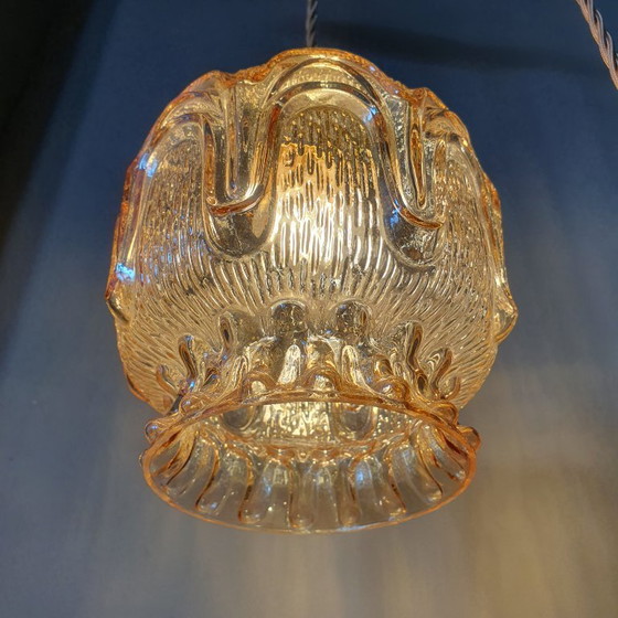 Image 1 of Set of 2 Vintage textured rose / amber tinted pendant lamps - mid-century design.