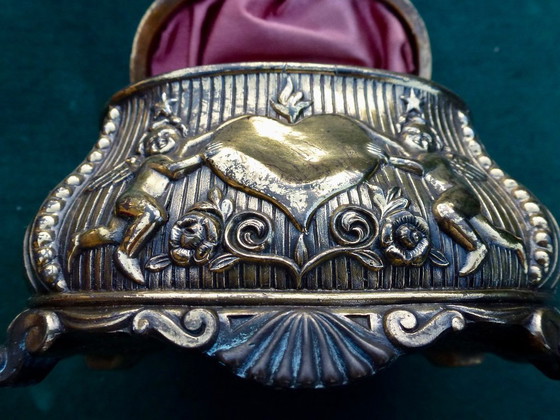 Image 1 of Old jewelry box with putti holding a heart!!