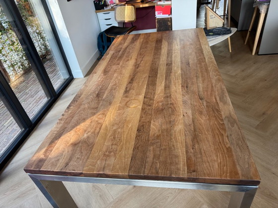 Image 1 of Walnut wood table with stainless steel legs