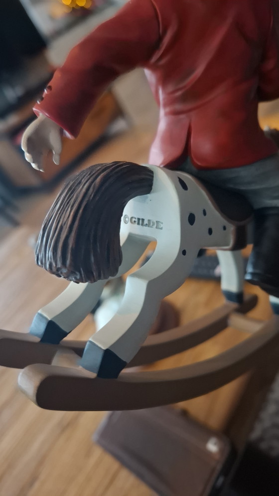 Image 1 of Guild clown on rocking horse