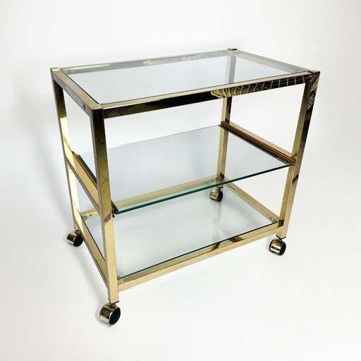 Vintage bijzettafel uit de jaren 80 met gouden chromen afwerking.