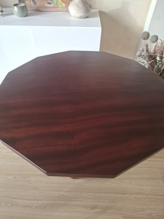 Image 1 of Interlocking African "unity" table.