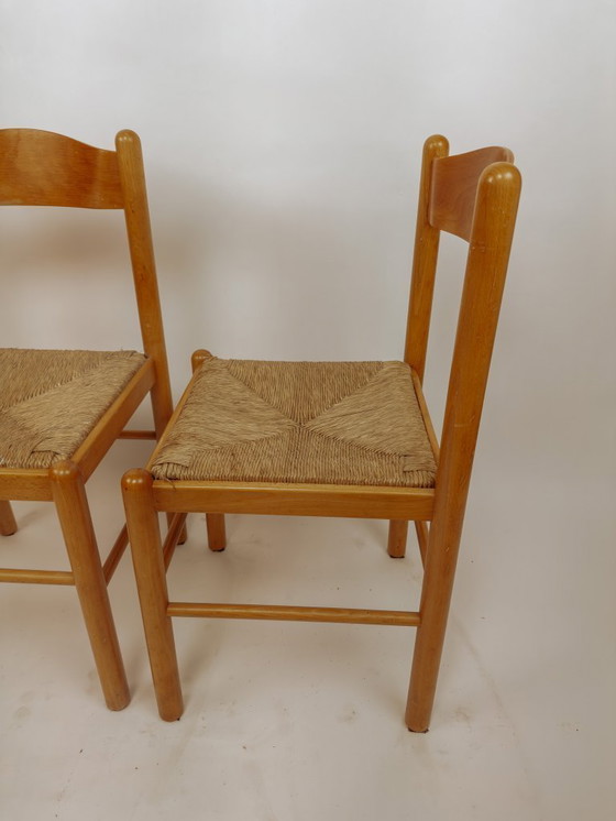 Image 1 of 2x houten Scandinavische eetkamerstoelen met biezen zitting