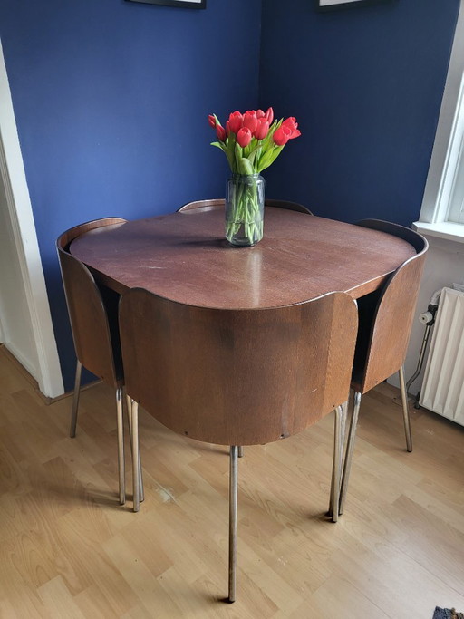 Dining set with four chairs, dark brown wood and black