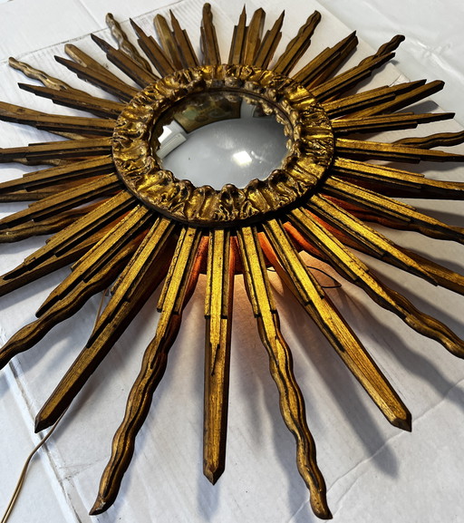 Double-sided wooden sunburst mirror with convex mirror and lamp, 1960s. Wall-mounted.