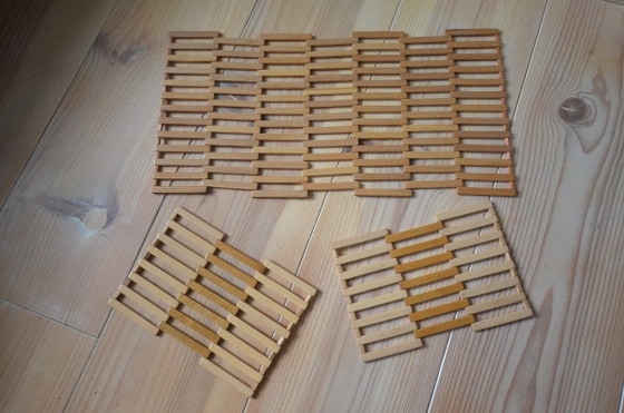 Image 1 of Vintage houten onderzetter, opvouwbaar