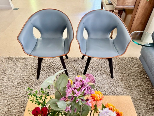 2x Poltrona Frau Design Kuipstoelen – Leather, Wood