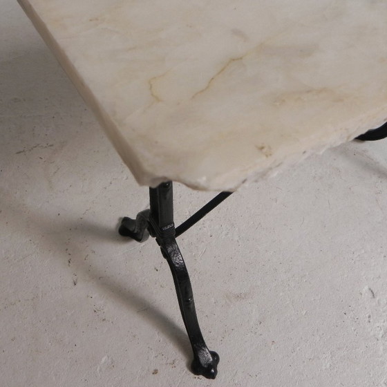 Image 1 of Table de bistrot avec plateau en marbre sur piètement en fonte, PARIS, années 1930
