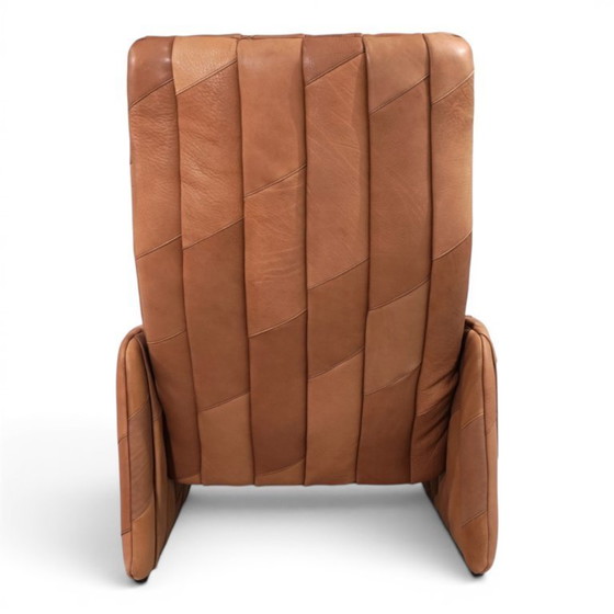 Image 1 of De Sede Ds 50 fauteuil met voetenbank, bekleed met buffelleer en patchwork, 1970
