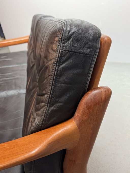 Mid-Century Design Komfort Solid Teak Wooden 3-Seat Sofa with Black Leather Cushions Attributed to Sven Ellekaer by Komfort