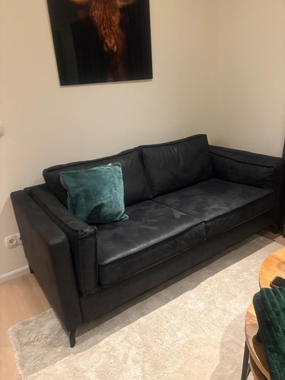 Image 1 of Black three-seater sofa - as good as new