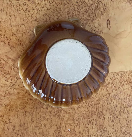 Image 1 of Brown shell saucer